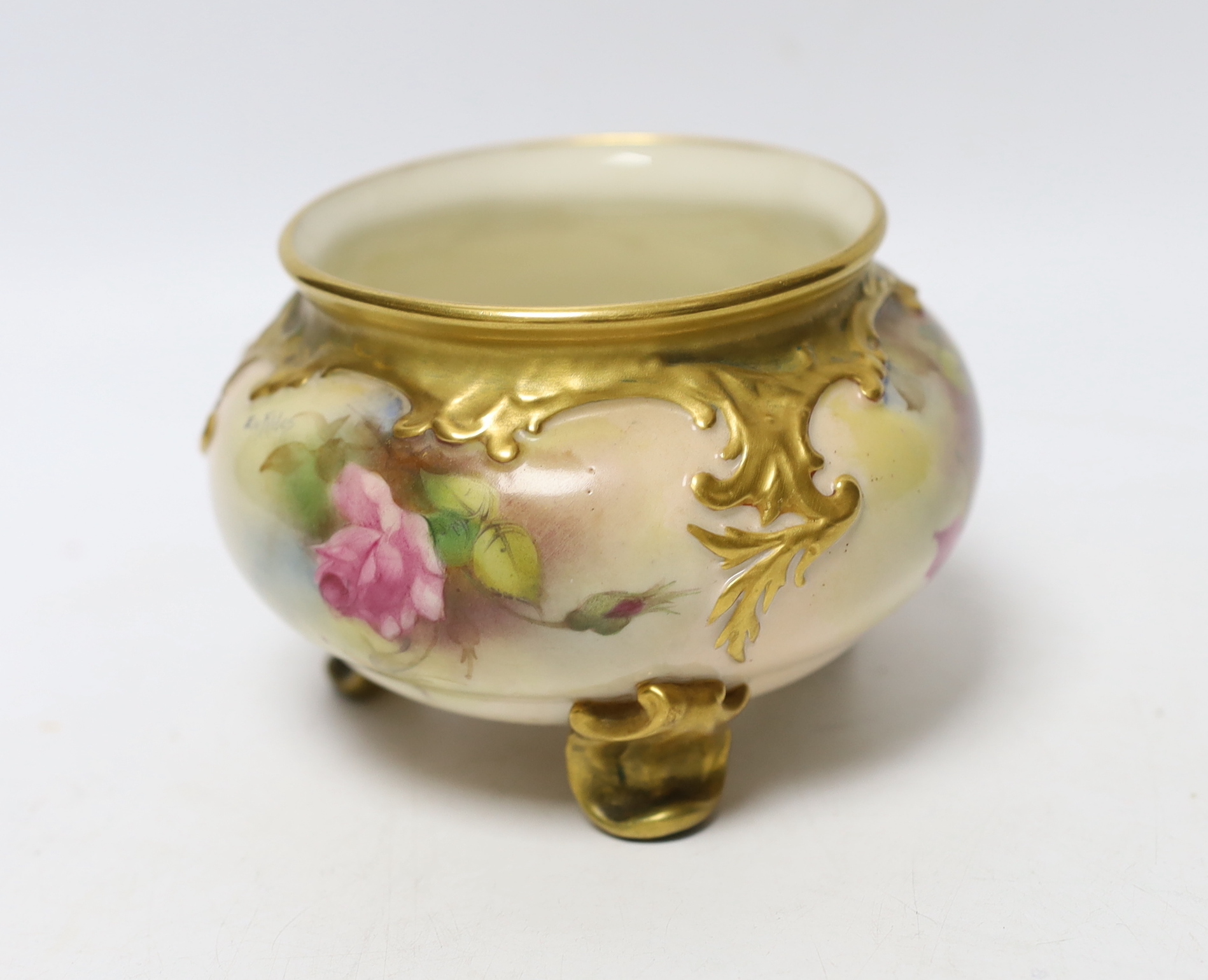 A Royal Worcester vase painted with roses, signed E M Fildes, 8cm high